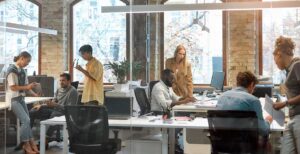People in an office working close together after installing ActivePure during the COVID crisis.