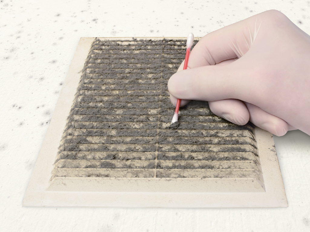 Dust build-up on air vent with gloved hand swiping with cotton swab