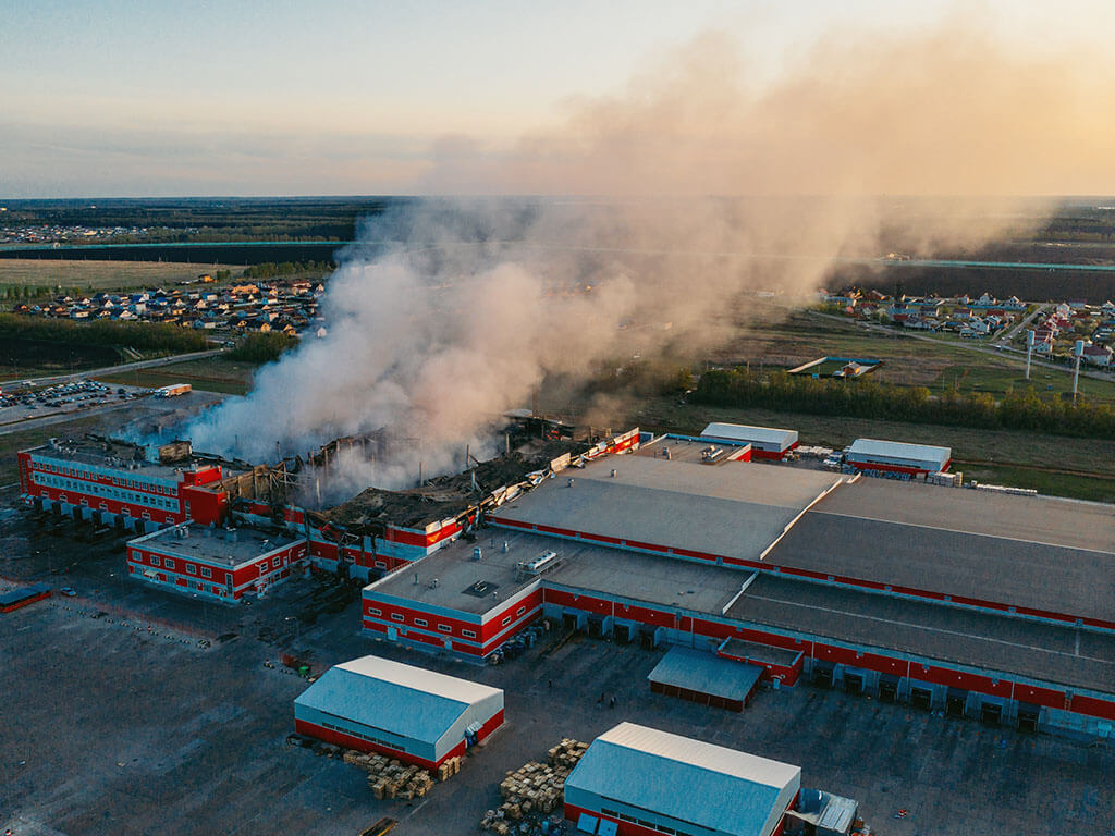 Fire in a building, air pollution is produced from fire. Major fires can be a major air pollution disaster if big enough.