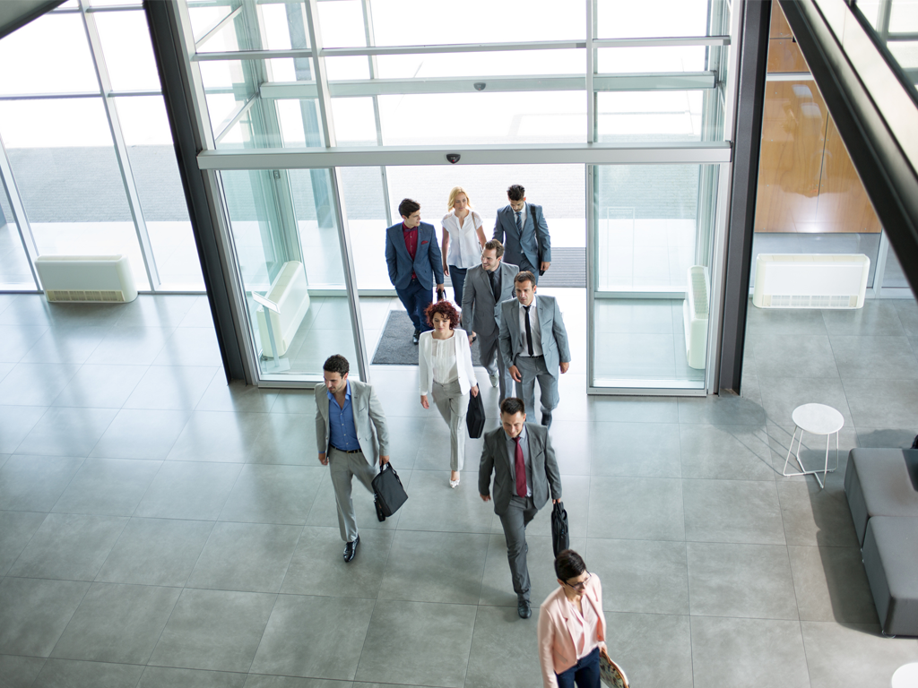 Advanced Air & Surface Purification Technology Blog - ActivePure Technology - Page 15 A group of employees walking into a business, Just as people can enter a business, outdoor pollution can affect Indoor Air Quality.