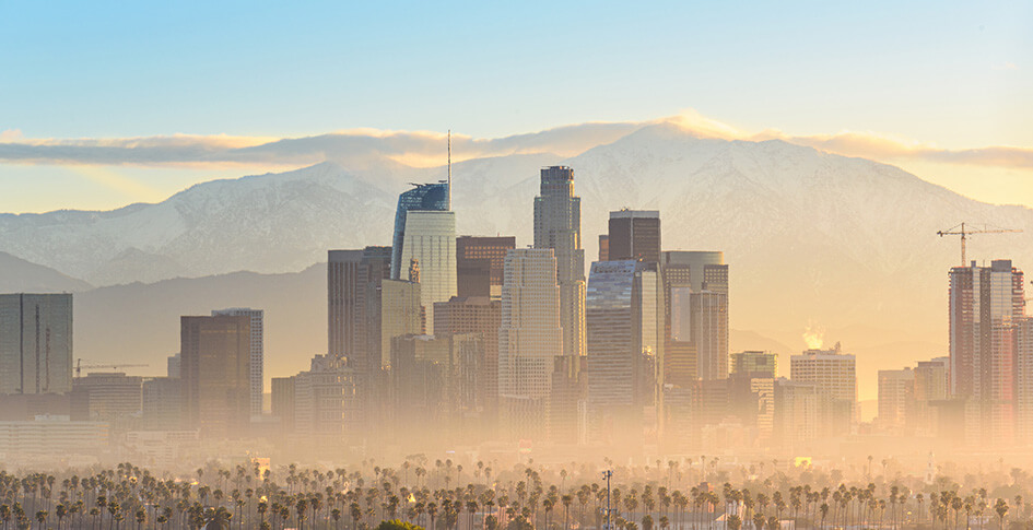 Los Angeles with smog, Temperature inversions cause the smog to linger making dangerous smog events.