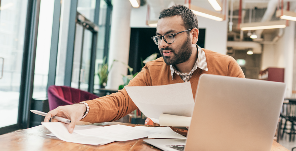 Business owner reviewing business expenses associated with Covid-19