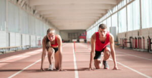 Runners at starting line, similar to beginning to race to learn about the different Air Filtration Technologies